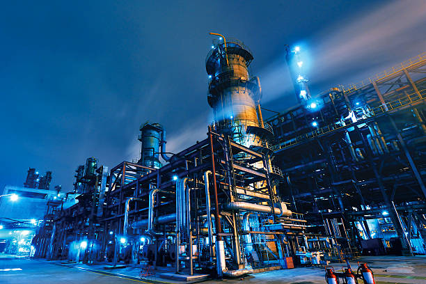 Oil Refinery, Chemical &amp; Petrochemical plant abstract at night.